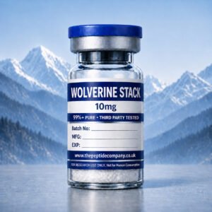 Wolverine Stack 10mg peptide vial by The Peptide Company, featuring 99%+ purity and third-party testing, displayed with a mountain backdrop